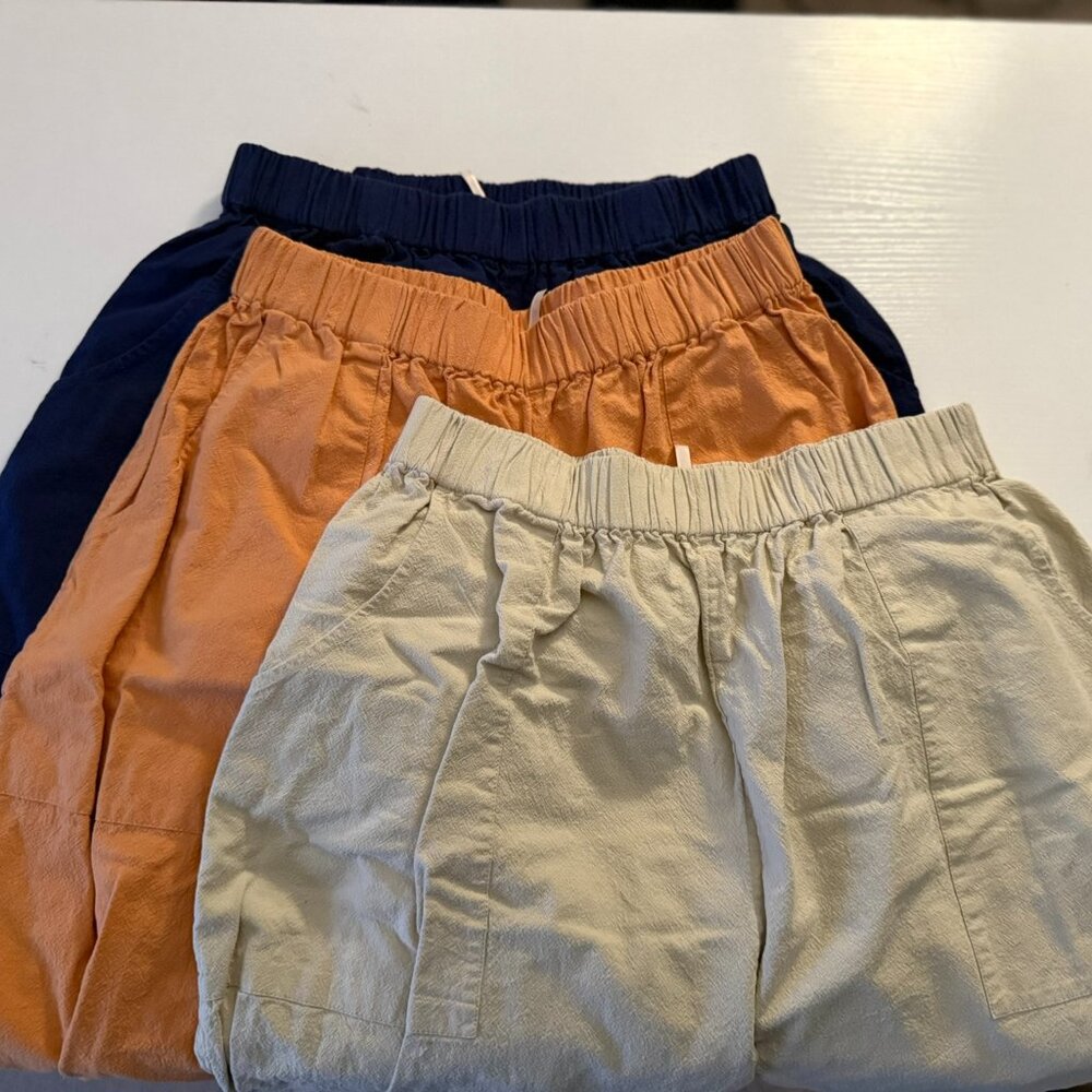 Free People Wide Leg Pants Trio in Navy, Orange, and Cream